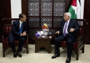 Palestinian President Mahmoud Abbas, right, meets with Israeli Zionist Union party leader Isaac Herzog, at the president's office in the West Bank city of Ramallah, Tuesday, Aug. 18, 2015. (AP Photo/Nasser Nasser)